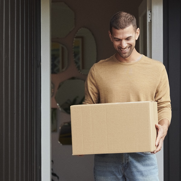 Man picking up courier delivery