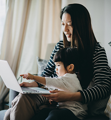 Girl looking at computer screen