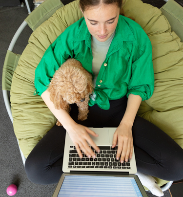 Girl typing on laptop