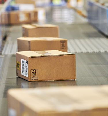 Courier items being sorted on conveyor belt