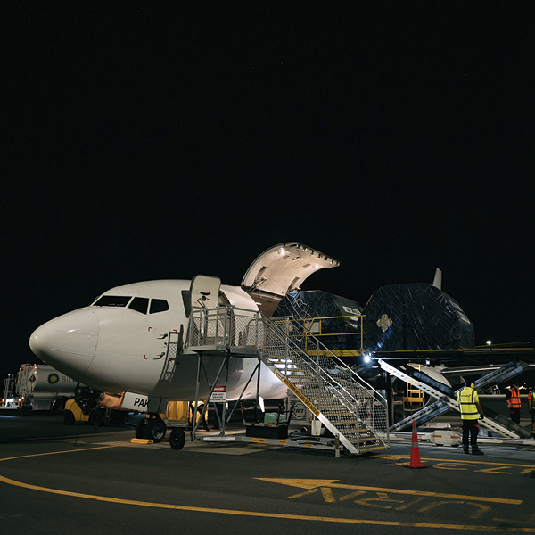 Freight aircraft being unloaded