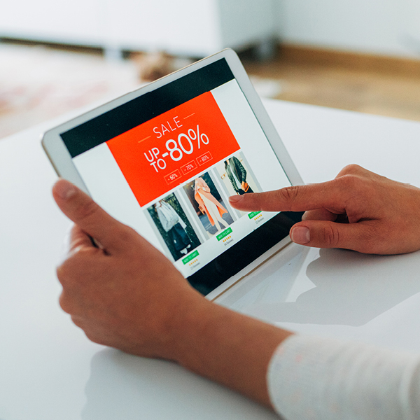 Woman shopping on tablet