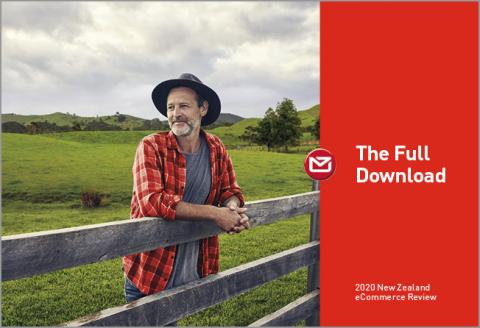 Man on a farm, leaning on fence