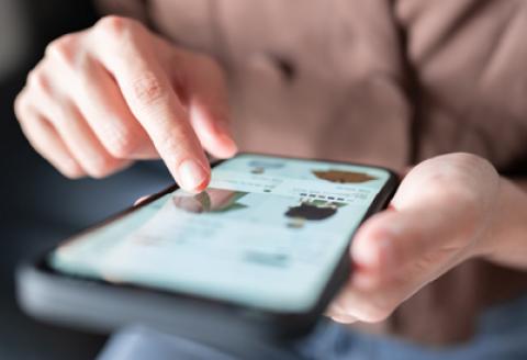 person shopping on their phone