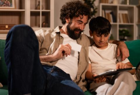father and son shopping online