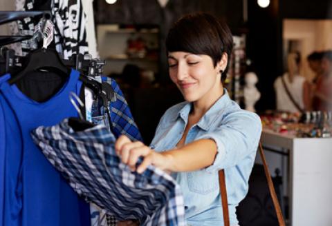 Woman shopping, looking at clothes