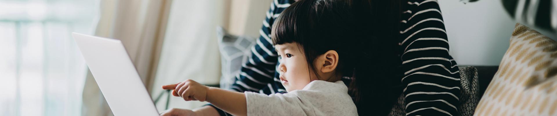 Girl looking at computer screen