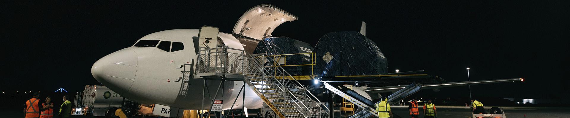 Freight aircraft being unloaded