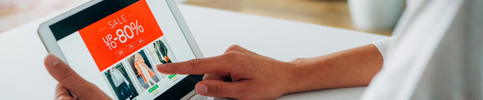 Woman shopping on tablet