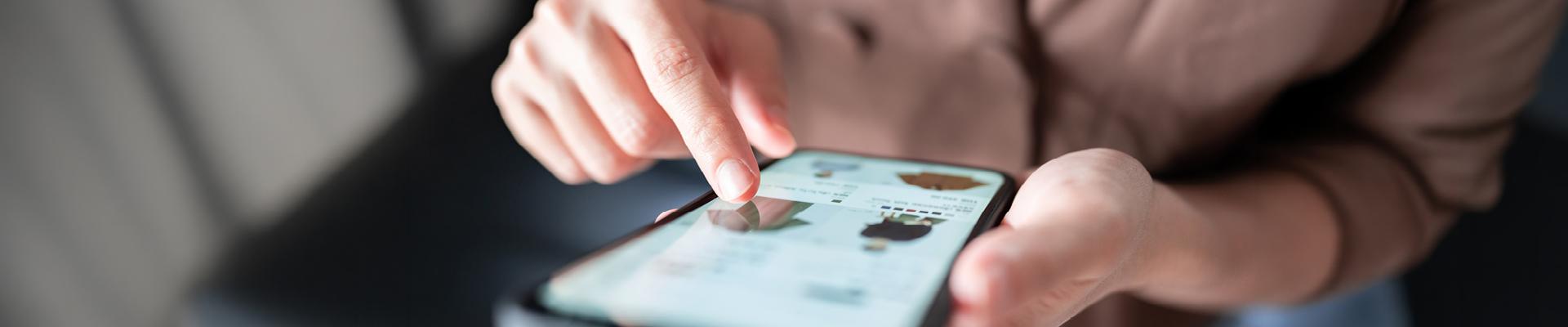 person shopping on their phone