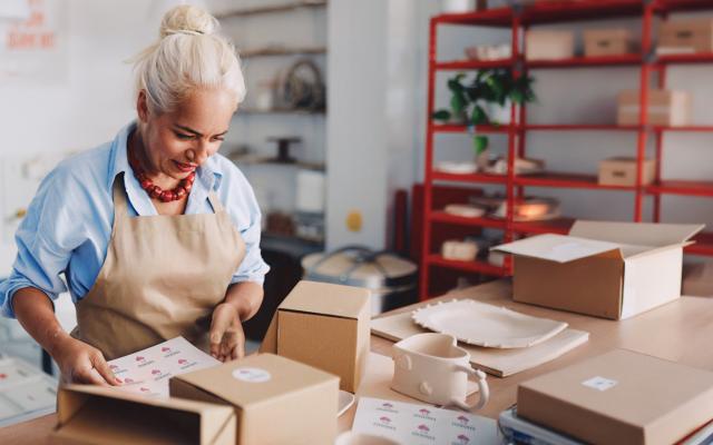 Woman looking down at packaging